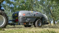 The GEO 3002 air-blast sprayer at work in an orchard of mirabelle plum trees