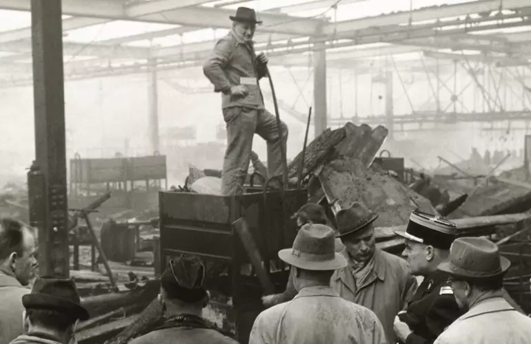 Mens working in the factory after the fire