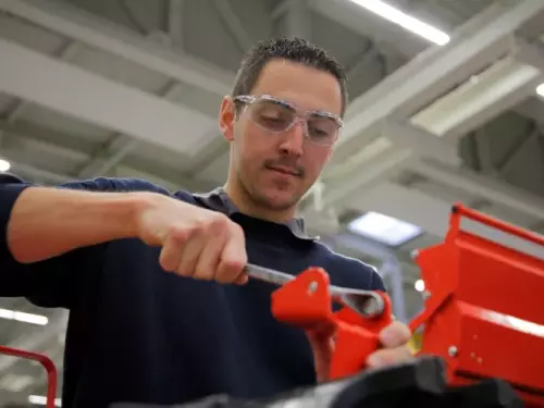 A man setting his machine