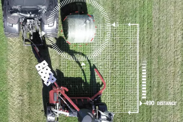 Funkcja AUTOLOAD stosuje laser do wykrywania zbliżającej się okrągłej beli.